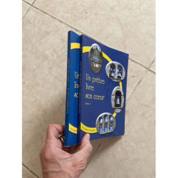 UN PRETRE LIVRE SON COEUR TOMES 1 ET 2 PAR L'ABBE RAYMOND....